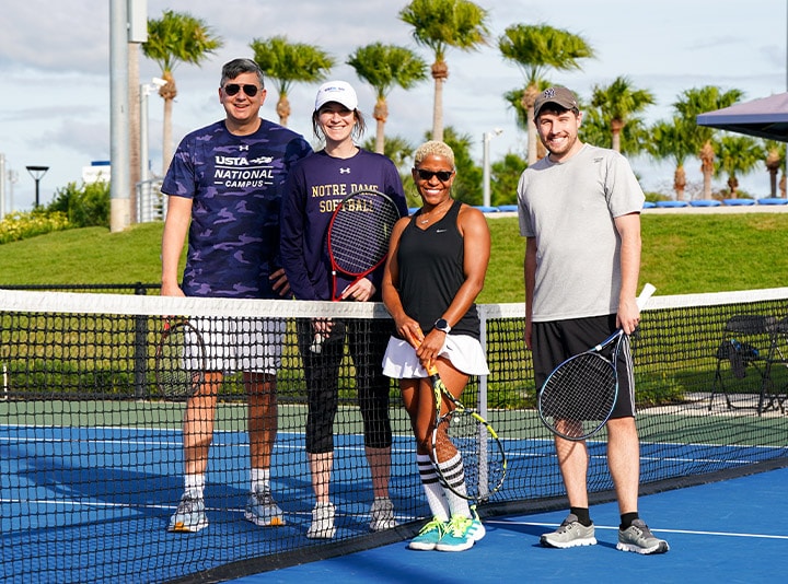 Players on tennis court
